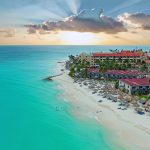 Aerial from Manchebo beach on Aruba island in the Caribbean at sunset